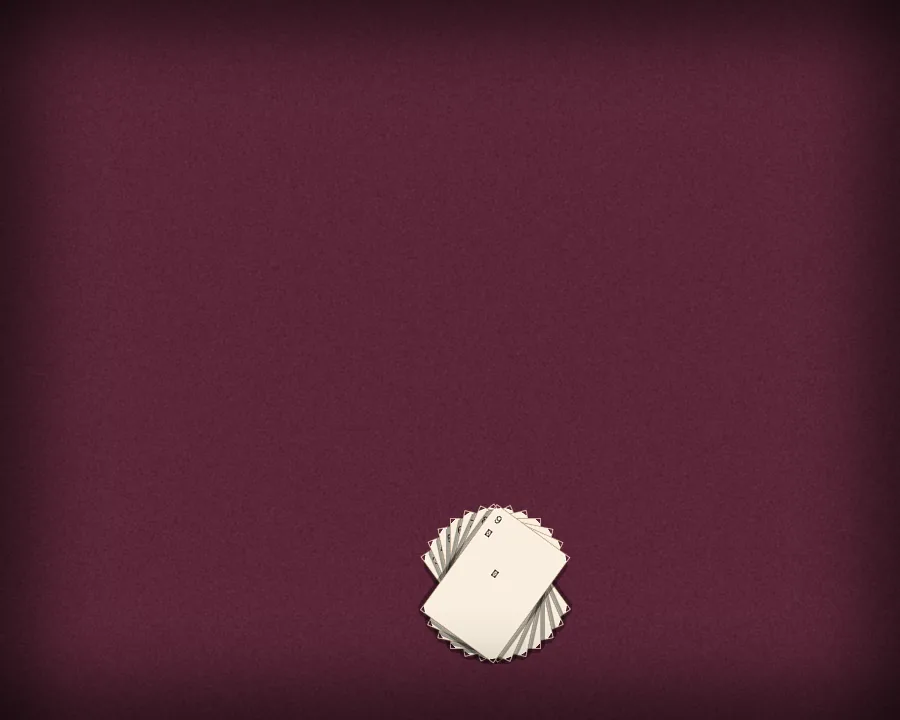 A hand of cards fanned like a peacock tail above a printed joker