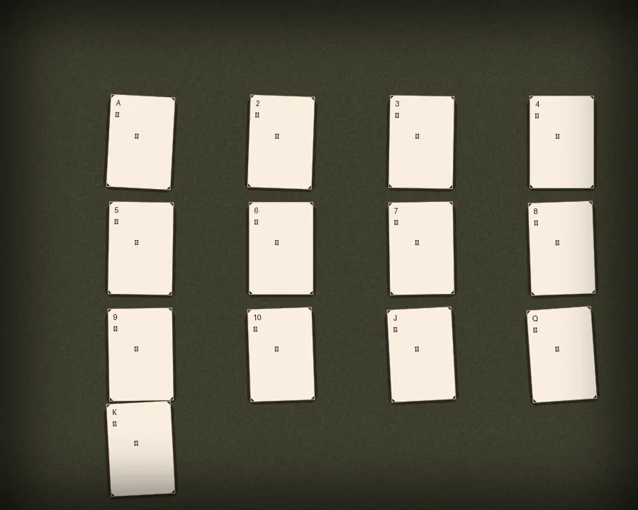 A close photograph of thirteen cards laid out in a single row on dark wood